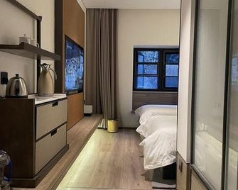 Shen Qi Hotel - Tai'an - Schlafzimmer