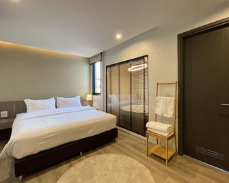 โรงแรมเดอะไรซ์ สวีทส์ เชียงใหม่ - เชียงใหม่ - ห้องนอน