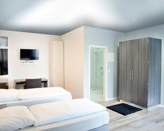 Looks Inn - Heidelberg - Bedroom