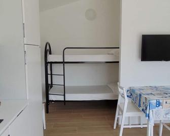 RS306 - Marcelli, monolocale in centro con parcheggio - Marcelli - Bedroom