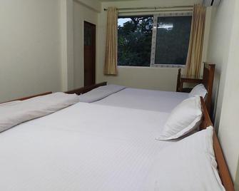 Tourist Inn - Jaipur - Bedroom