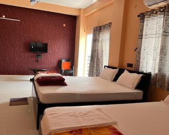 Hotel Krishna Paradise - דאוגהאר סאדאר - חדר שינה