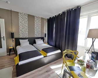 لابارتوتيل إل إتش إل - ديجون - غرفة نوم