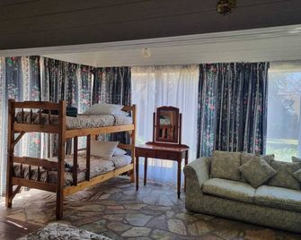 에메랄드 게스트하우스 - 켐프턴파크 - 침실