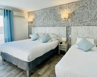 أوتيل لي بالميير أون كامارج - سانت- ماري-دو-لا-مير - غرفة نوم