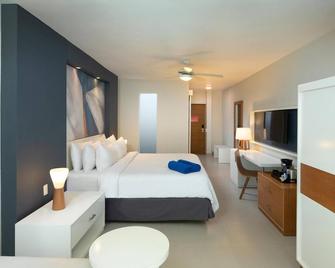 Emotions by Hodelpa - Juan Dolio - Guayacanes - Habitación