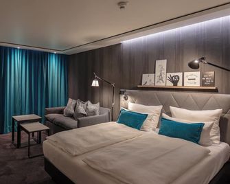 Motel One Saarbrücken - Саарбрюккен - Спальня