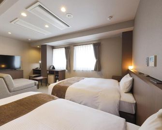 Matsue Urban Hotel - Matsue - Bedroom