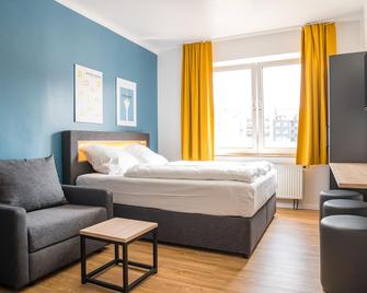 أنتيريس أبارتمنتس - دوسيلدورف - غرفة نوم