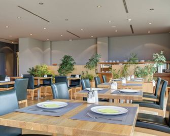 eXo Fly Level 4 Hotel Stuttgart-Flughafen - Ostfildern - Restaurant