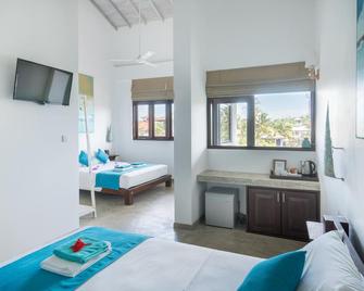 At Ease Beach Hotel - Hikkaduwa - Schlafzimmer