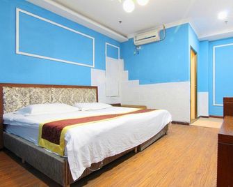 Yingtian Hotel - Tsjoengking - Slaapkamer
