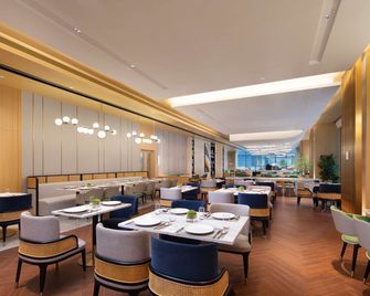 Hilton Garden Inn Beijing Huaxiang Tiantan Hospital - בייג'ין - מסעדה