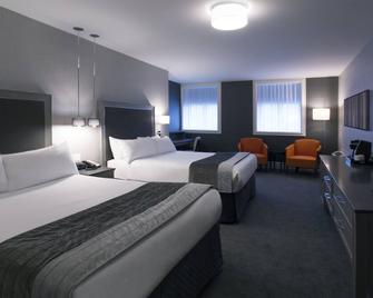 Hotel Manoir Victoria - קוויבק סיטי - חדר שינה