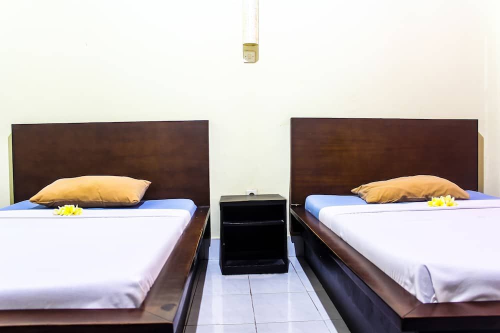 Budhi beach inn - קוטה - חדר שינה