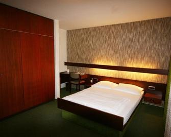 City Hotel und City Apartments Centrum - Kaiserslautern - Bedroom