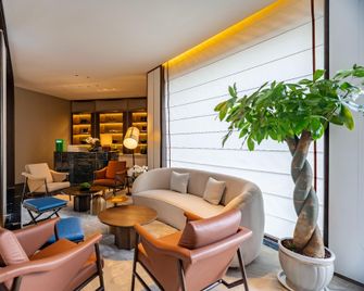 Madison Hotel Weihai Weigao Plaza - Weihai - Lounge