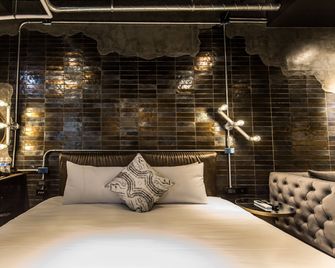 Bellus Inn - Tainan - Sovrum