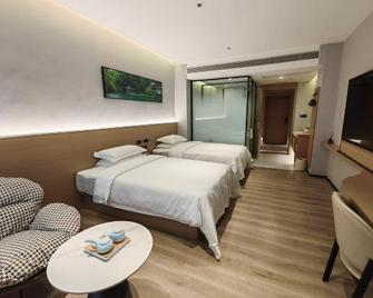 Jindun Linye Business Hotel - Baoshan - Slaapkamer