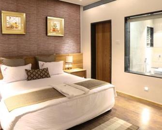 Hotel Preeti Executive - Sātāra - Bedroom