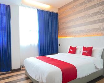 OYO 89624 4orty Inn - Бінтулу - Спальня