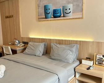 Rose Inn - Pangandaran - Habitación
