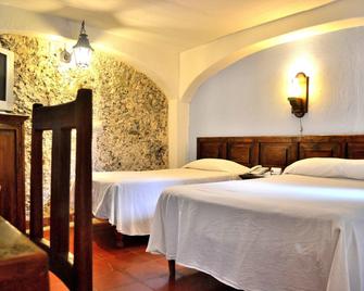 بوزادا ديل كافيتو - خالابا - غرفة نوم