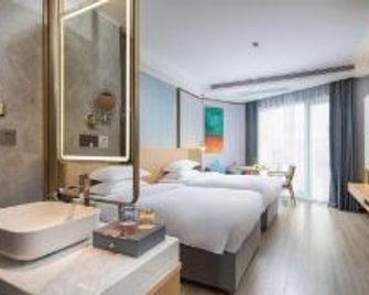 Shixi Landscape Hotel - Guilin - Schlafzimmer