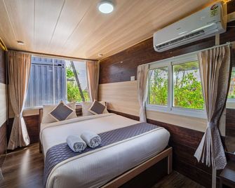 Dusk and Dawn Beach Resort - Rameswaram - Slaapkamer