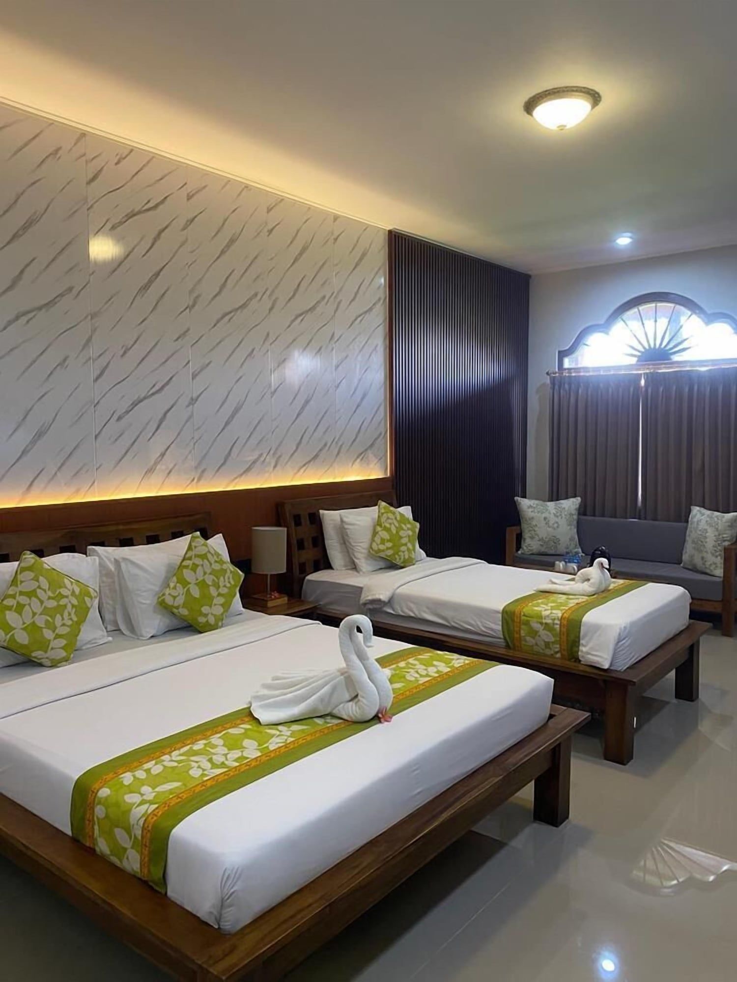 ثري براذرز بنجالوز آند فيلاز - كوتا - غرفة نوم