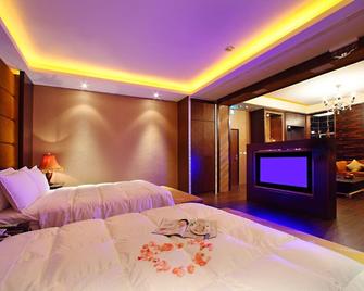 Le Chateau Hotel - Zhushan Township - Camera da letto