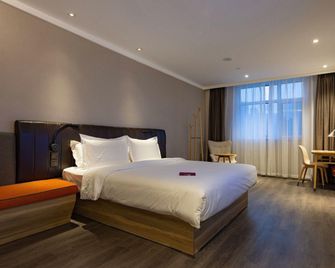 Hanting Premium Hotel Tianjin Huabei Group Metro Station - Tianjín - Habitación