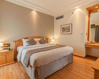 Millennium Downtown Abu Dhabi - Abu Dhabi - Schlafzimmer