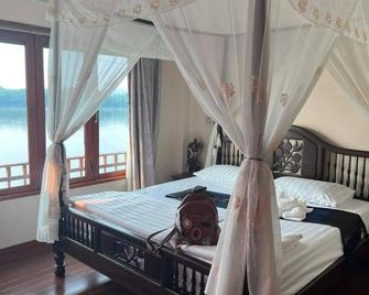 9 เฮ้าส์ เชียงคาน - Chiang Khan - Bedroom