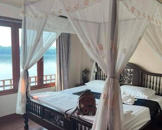 9 เฮ้าส์ เชียงคาน - Chiang Khan - Bedroom