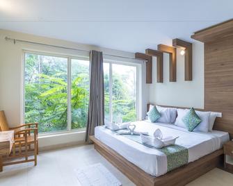 Adithya Nature Resort & Spa - Vythiri - חדר שינה