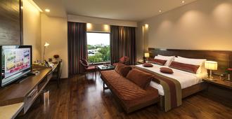 Fortune Pandiyan Hotel - מדוראי - חדר שינה