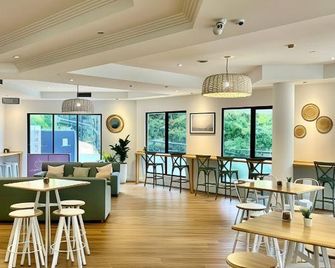 Oakwood Hotel & Apartments Brisbane - בריסביין - מסעדה