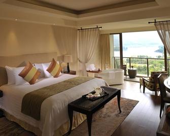 New Century Resort Jiulong Lake Ningbo - Ningbo - Schlafzimmer