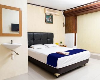 Anak Mama Hotel - סוראבאיה - חדר שינה