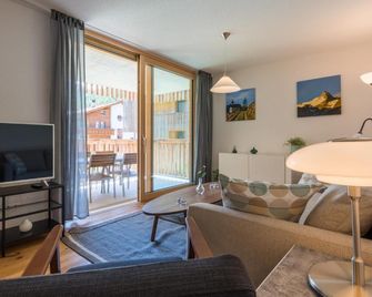 Montela Apartment-Hotel & Resort in the holiday region Saas-Fee Saastal - Saas-Grund - Living room