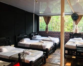 Hostal Las Mariposas Minca - Minca - Спальня