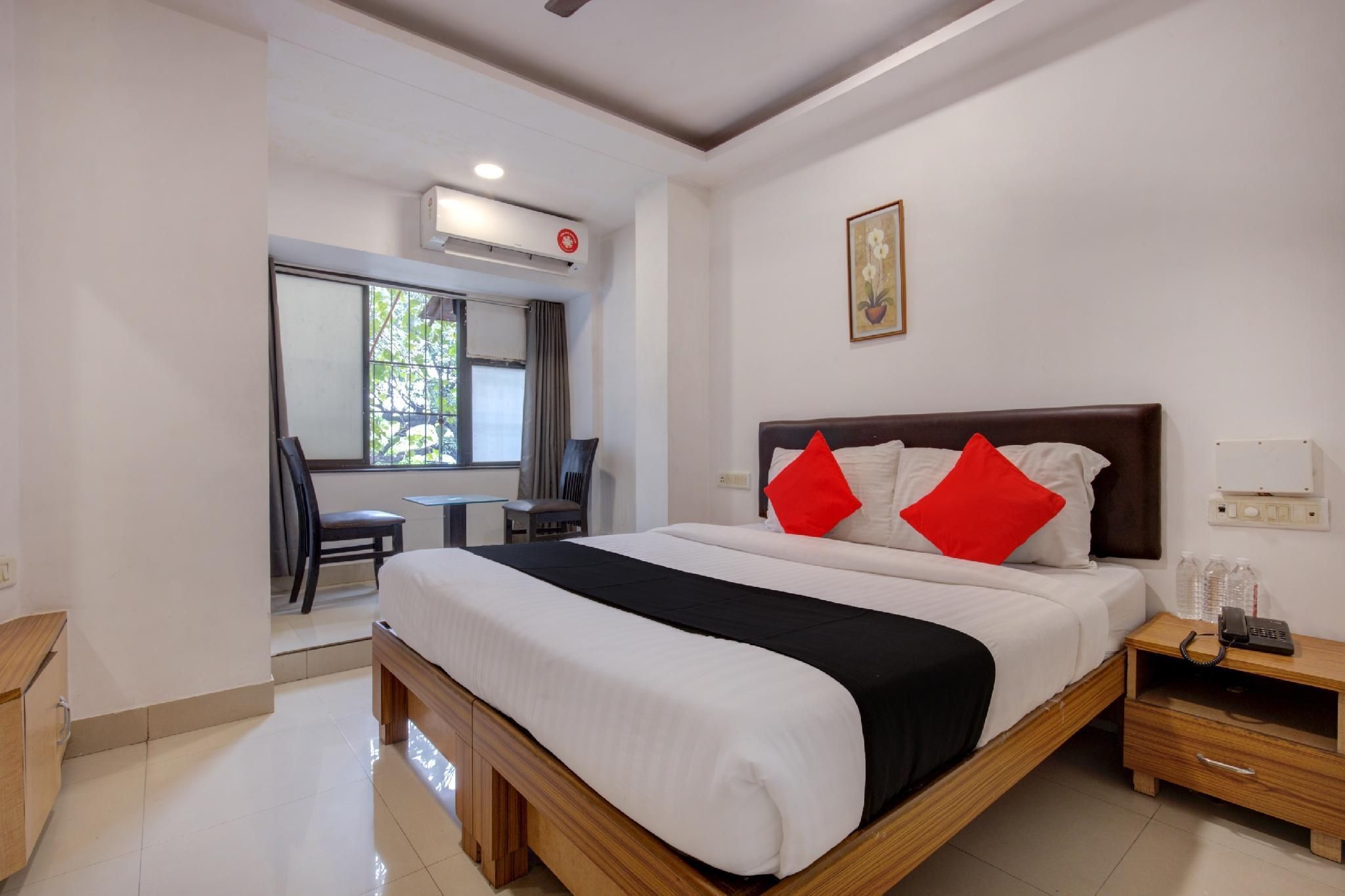 Capital O 77295 Hotel Bansidhar Bhuvan - مومباي - غرفة نوم