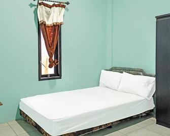 Spot On 91791 Homestay Surya Syariah - Tarakan - Bedroom