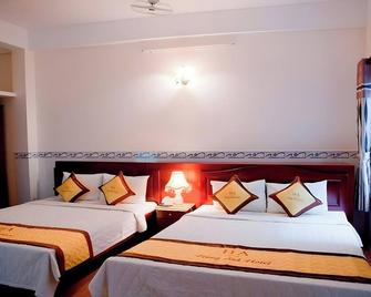 Hung Anh Hotel - הו צ'י מין סיטי - חדר שינה