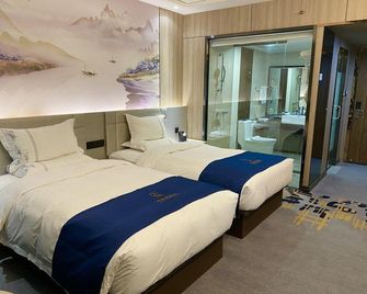 Rongda International Hotel - Yulin - Bedroom