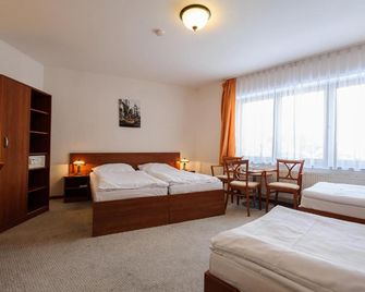 Alexis - براغ - غرفة نوم