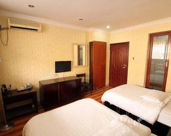 Guilin Xinxin Hotel (Guilin Railway Station Shop) - Guilin - Schlafzimmer