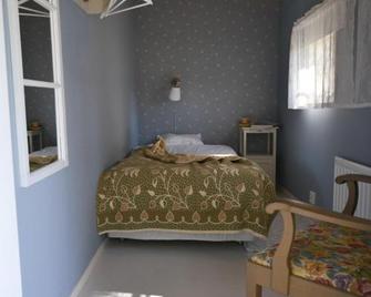 Bull-August gård vandrarhem/hostel - Arholma - Habitación