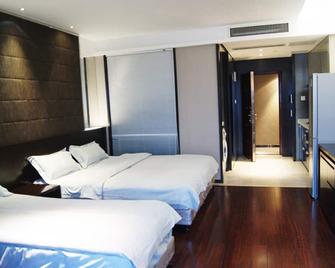 Nanjing Kaibin Apartment Zhujianglu Muma - Nanjing - Schlafzimmer